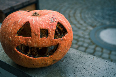 High angle view of pumpkin on stone wall during halloween