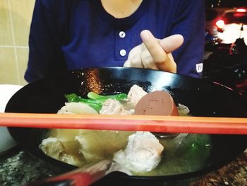 Close-up of person preparing food