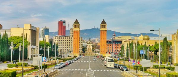 Road amidst venetian towers against sky