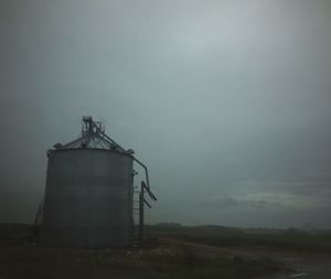 Low angle view of water tower against sky