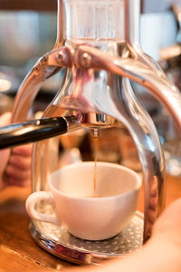 Close-up of coffee cup on table