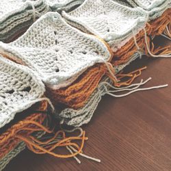 High angle view of crochets on wooden table