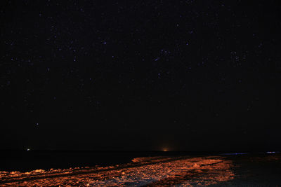 Scenic view of illuminated star field against sky at night