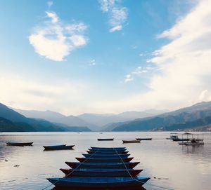 Pier over lake against sky