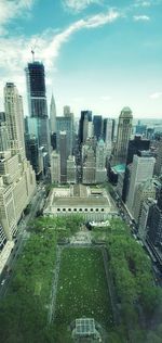 High angle view of buildings in city against sky