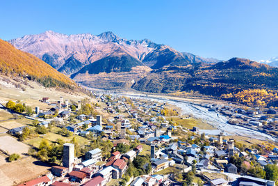 High angle view of snowcapped mountains against sky