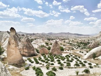 Panoramic view of rock formations against sky