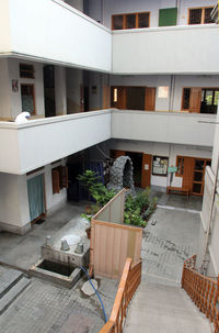 Potted plants on table outside building