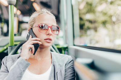 Young woman using mobile phone