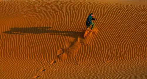 High angle view of man with umbrella