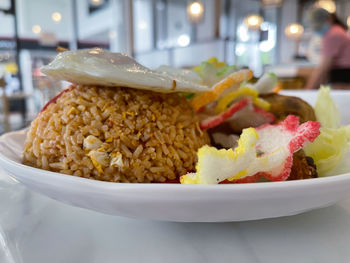 Close-up of burger in plate on table