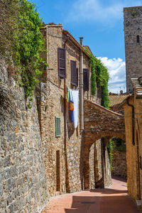 Old village with hanging laundry in a alley