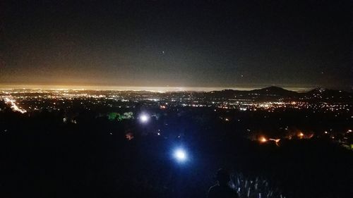 Aerial view of illuminated cityscape