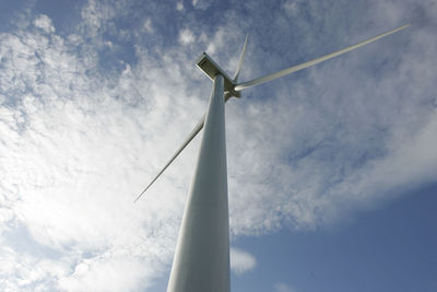 Low angle view of windmill against sky