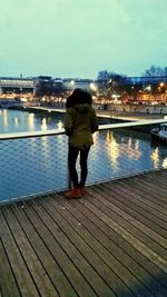 Man standing on pier