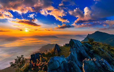 Sunrise and misty at doi phatang viewpoint, chiangrai province, thailand