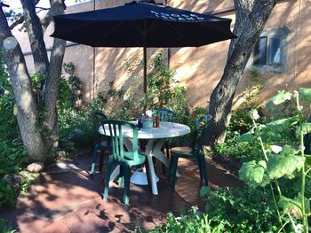 Chairs and tables at sidewalk cafe