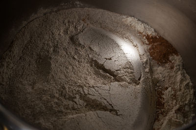 Close-up of old bread in container