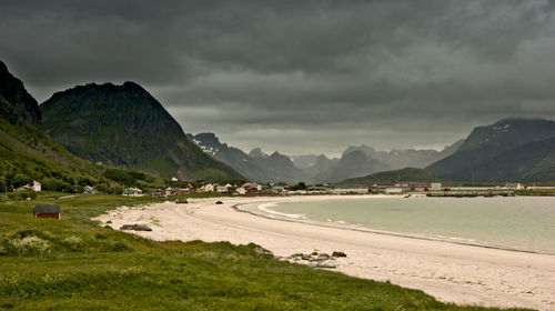 Scenic view of landscape and mountains against sky