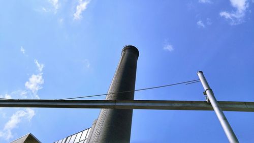 Low angle view of built structure against blue sky