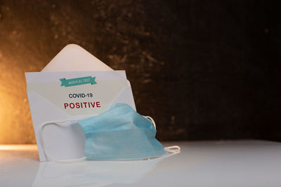 Close-up of text on white table