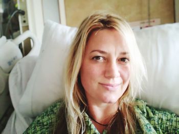 Portrait of smiling woman at home