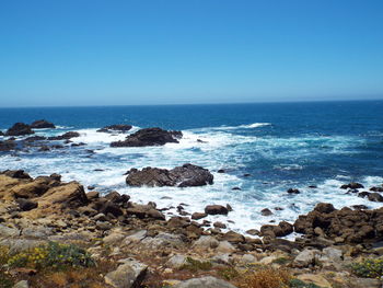 Scenic view of sea against clear sky