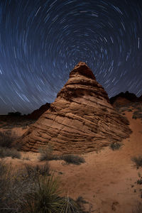 Red sandstone rock formation in remote arizona desert under a st