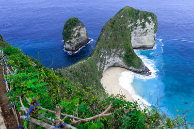 High angle view of rocks in sea