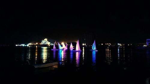 Illuminated fountain at night