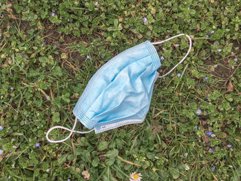 High angle view of umbrella on field