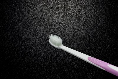 High angle view of crystal ball against black background