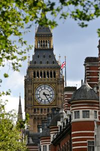 Low angle view of big ben against sky in city