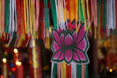 Close-up of multi colored decorations for sale in market