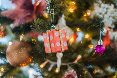 Close-up of christmas decoration hanging on tree