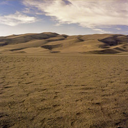 Scenic view of desert against sky