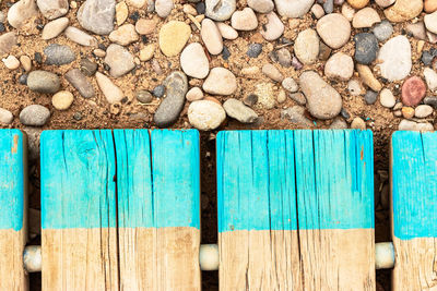 High angle view of stones on wood