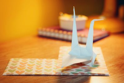 Close-up of paper toy on table