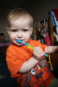 Portrait of cute baby boy with toothbrush