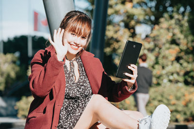 Young woman using mobile phone