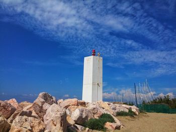 Low angle view of lighthouse against sky