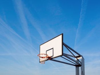 Low angle view of basketball hoop against wall