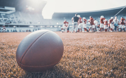 Group of people relaxing on field