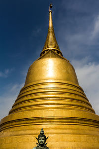 Low angle view of temple against building