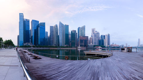 Modern buildings in city against sky