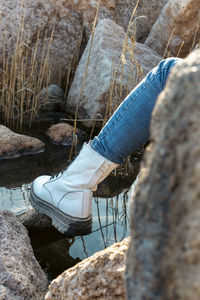 Water reflections on a rocky shore