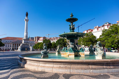 Fountain in front of building