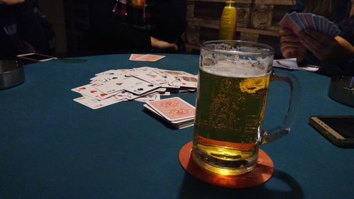 Close-up of beer glass on table