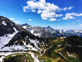 Scenic view of snowcapped mountains against sky