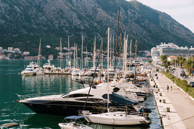 High angle view of boats moored at harbor